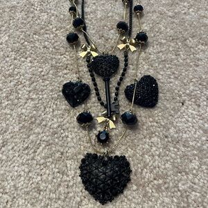 Black and gold Betsy Johnson necklace